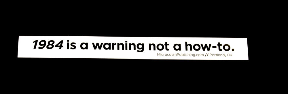 Sticker #397: 1984 Is a Warning Not a How-to