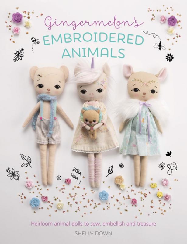 Cover with photo of embroidered stuffed animals