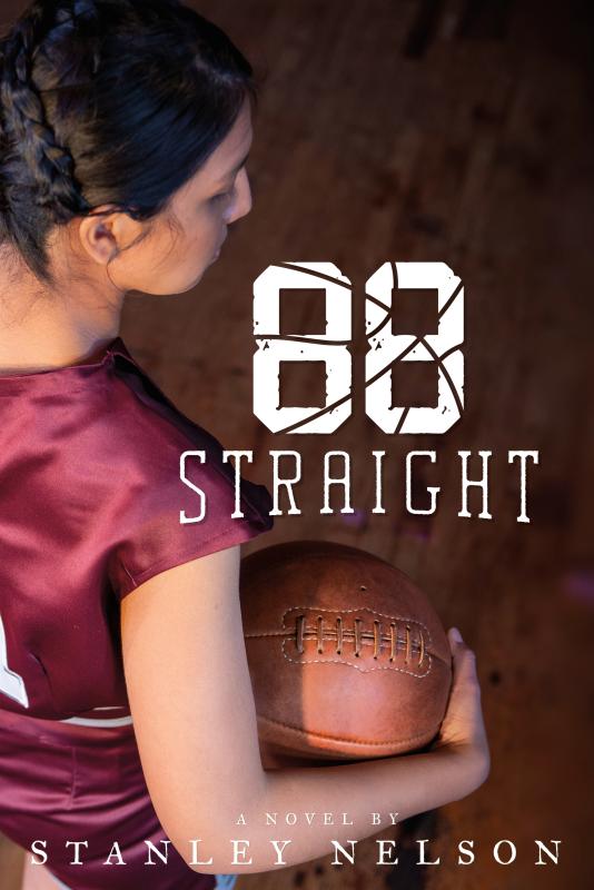 a woman cradles a basketball. 