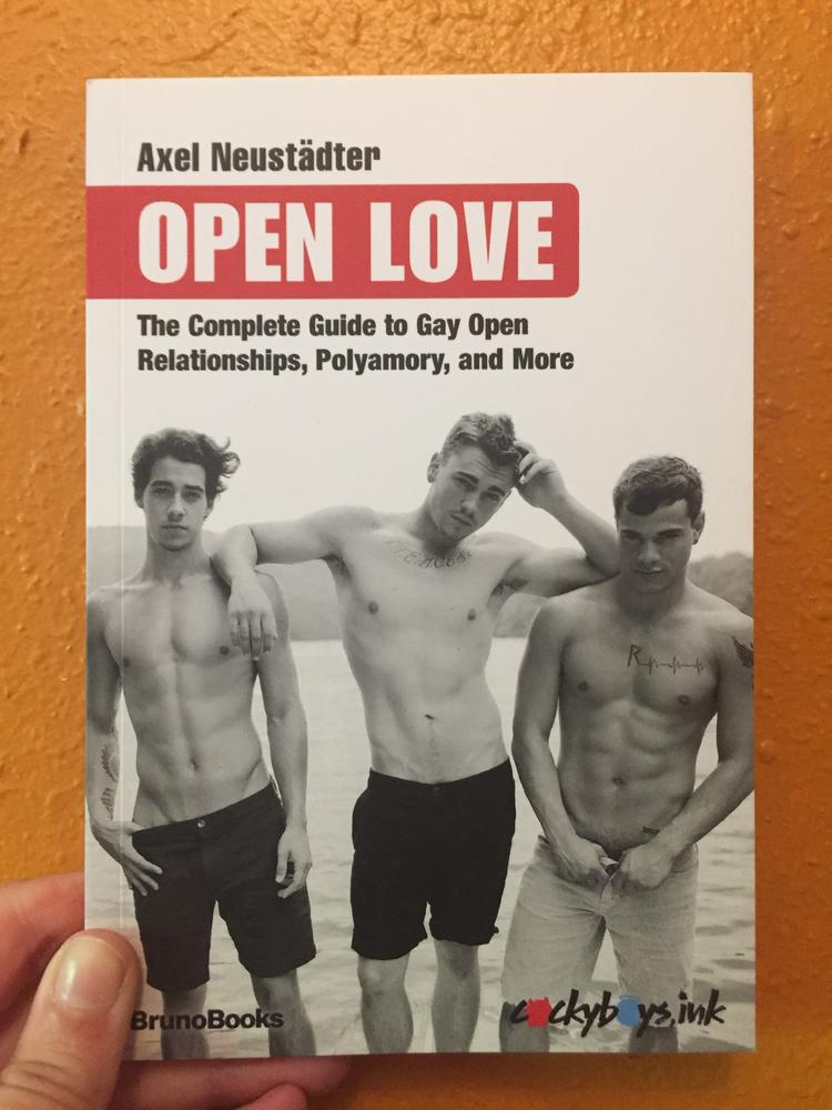 Black and white image of three dudes at the beach