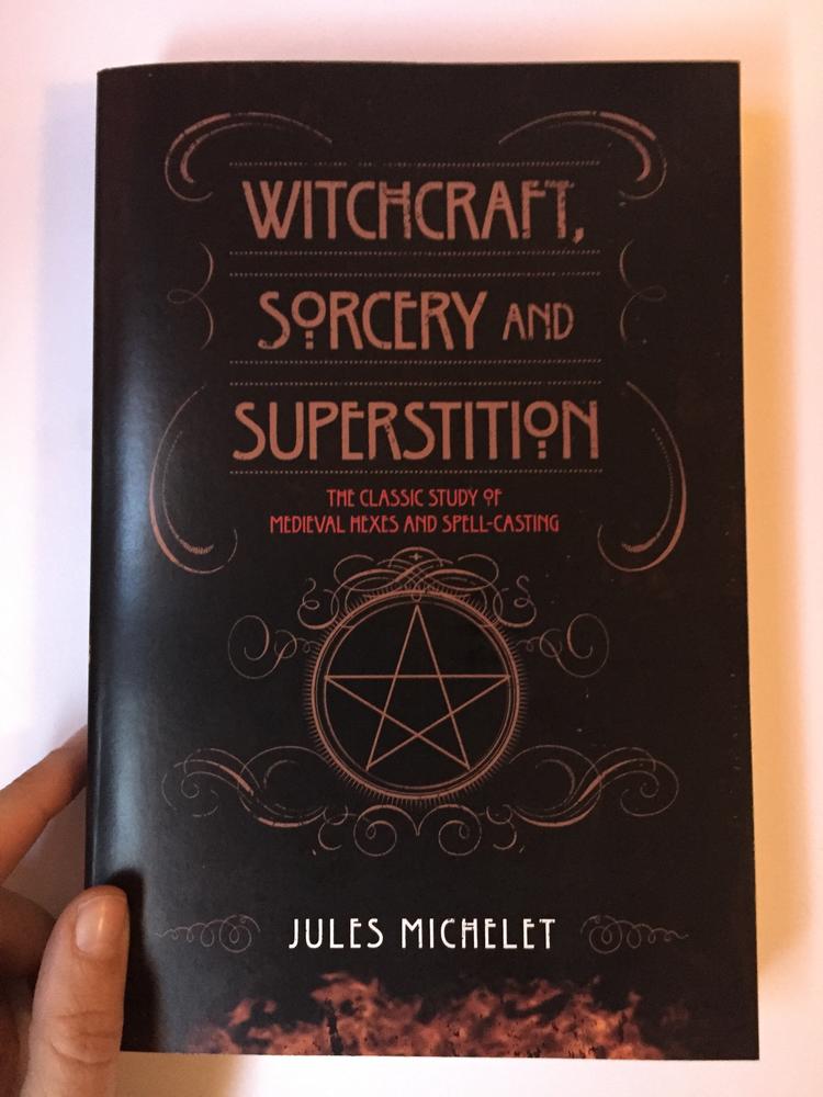 Black cover with pentagram in the center