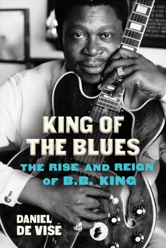 BB King holding a guitar