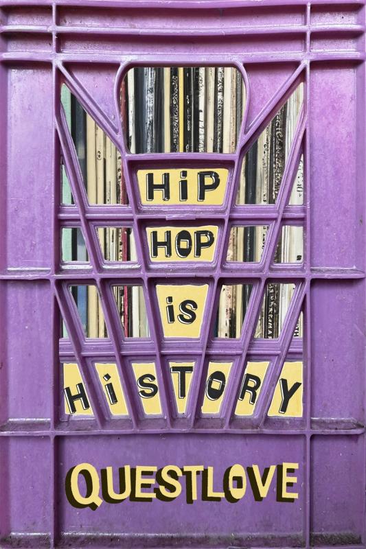 a collection of records in a purple milk crate