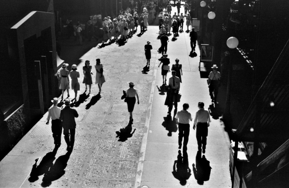 a street full of people just walking