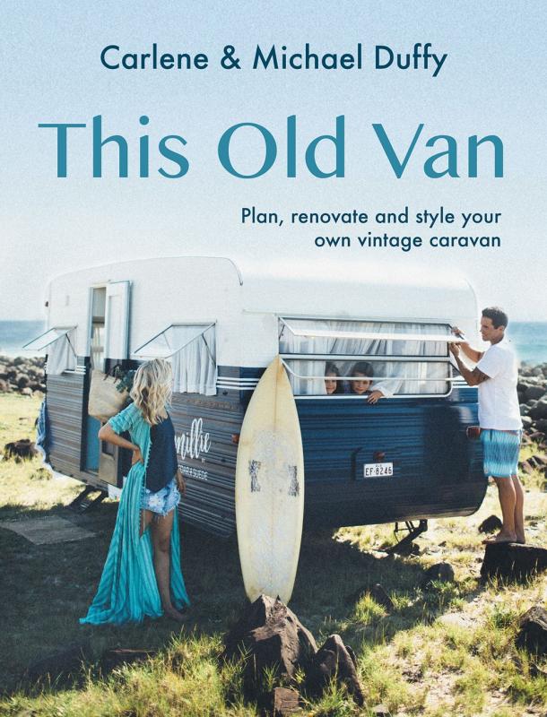 A photo of a family using a vintage camper on the coast