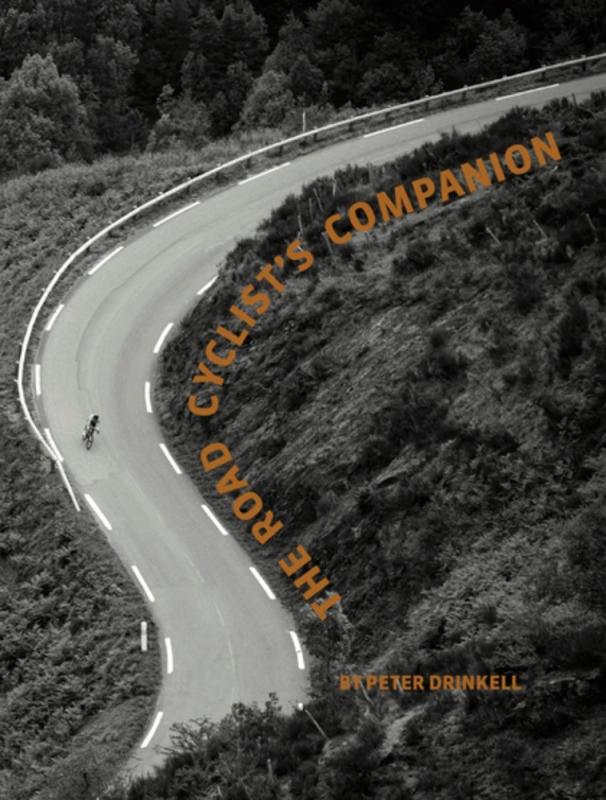 a cyclist on a winding mountain road