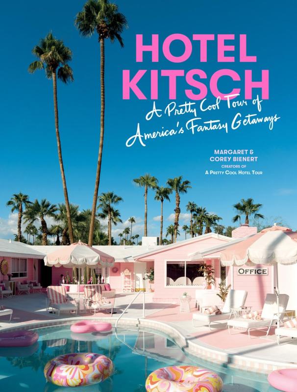 a vibrant photograph of a swimming pool next to a baby pink hotel, with tall palm trees in the background