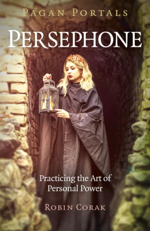 Book cover featuring photograph of a woman in a robe, standing in a stone doorway holding a lantern.