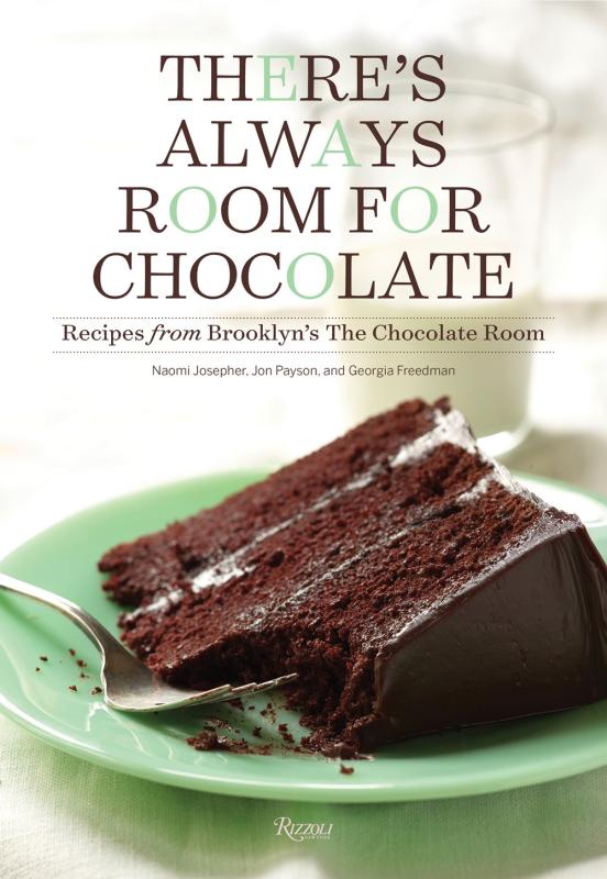 white cover with slice of chocolate cake on green plate with brown text