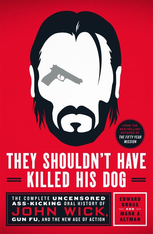 Red cover with an illustration of John Wick with a gun for an eye.